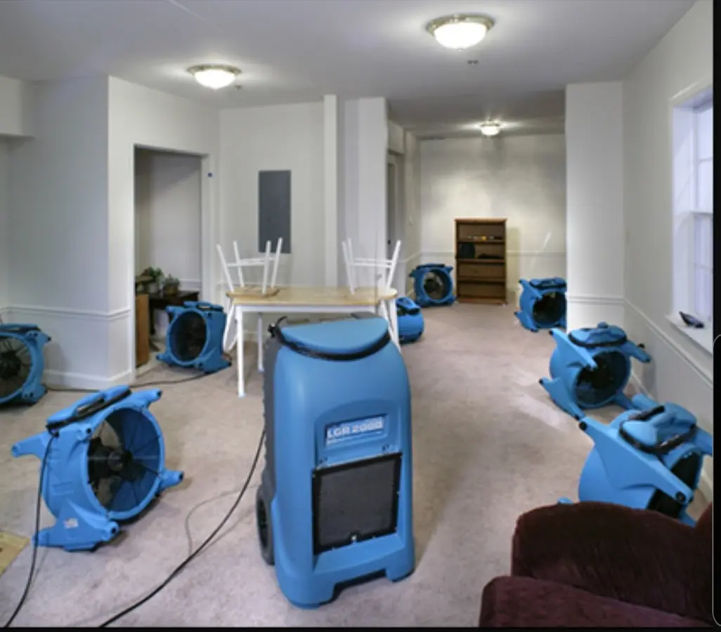 Air movers and dehumidifier setup for Water Damage Restoration in South Charleston